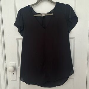H&M size 8 flounce sleeve blouse. So flattering and light.